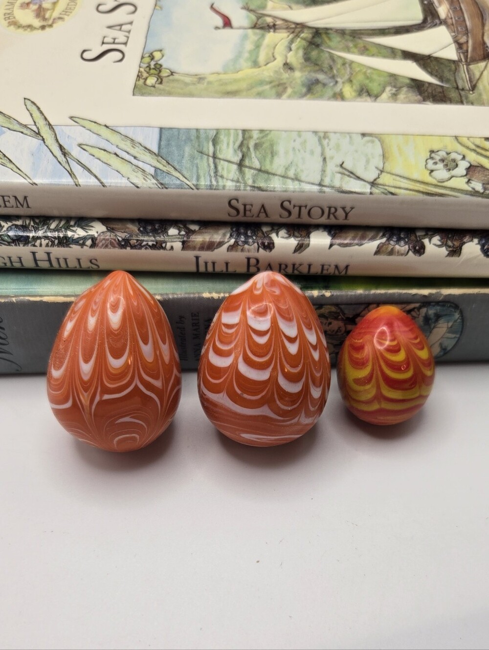 Set Of 3 Handmade Glass Eggs With Swirl Patterns Mini Orange Yellow White